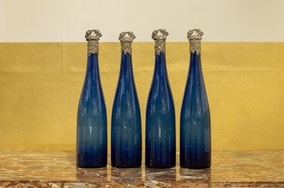 Lot 202 - A set of four Victorian blue glass decanters