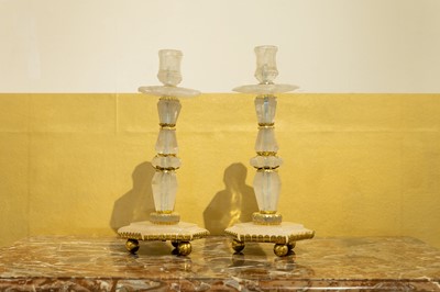 Lot 287 - A pair of gilt-metal-mounted rock crystal candlesticks