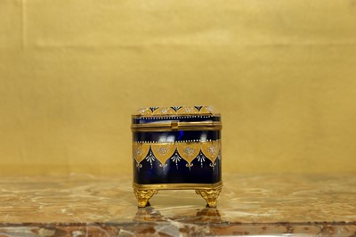 Lot 403 - A blue and gilt glass casket