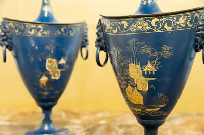 Lot 272 - A pair of painted and japanned toleware chestnut urns
