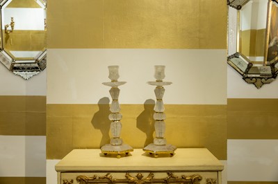 Lot 288 - A pair of gilt-metal-mounted rock crystal candlesticks