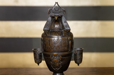 Lot 244 - A bronze model of a canopic jar