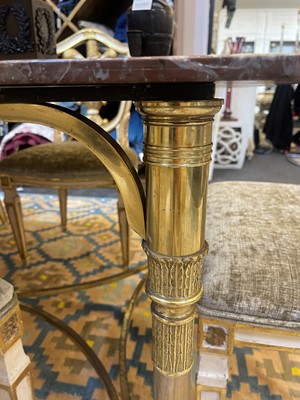 Lot 41 - A neoclassical gilt-bronze dining table