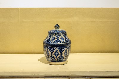 Lot 201 - A pottery blue and white glazed stoneware jobbana