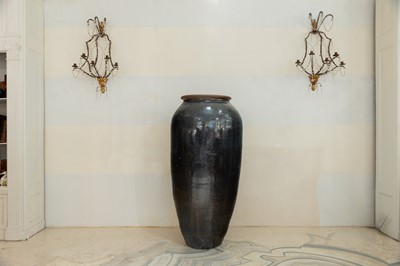 Lot 369 - A large brown drip-glazed stoneware water butt