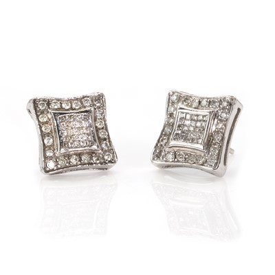 Lot 64 - A pair of white gold diamond cluster earrings