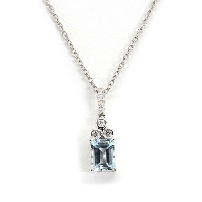 Lot 161 - An 18ct white gold aquamarine and diamond pendant and chain