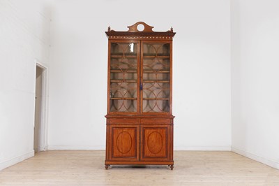 Lot 654 - An Edwardian strung and crossbanded satinwood bookcase