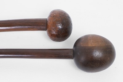 Lot 378 - Two wooden throwing clubs (i ula kitu)