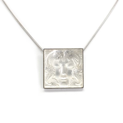 Lot 223 - A silver and glass 'Masque de Femme' necklace and earring set, by Lalique