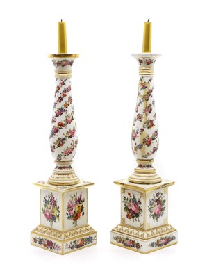 Lot 172 - A pair of porcelain candlesticks