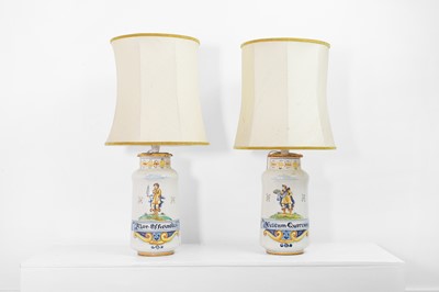 Lot 689 - A pair of maiolica lamps