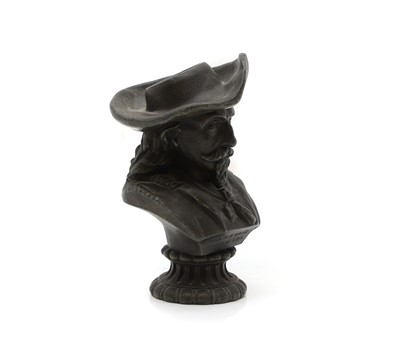 Lot 258 - A spelter match striker
