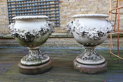 Lot 438 - A pair of salt-glazed garden urns