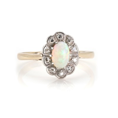 Lot 188 - An opal and diamond cluster ring
