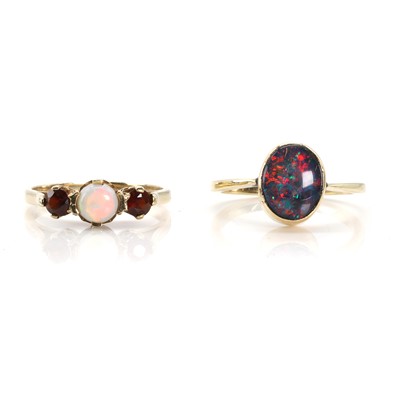 Lot 262 - A 9ct gold opal and garnet ring and an opal triplet ring