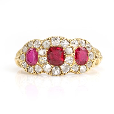 Lot 18 - A Victorian ruby and diamond triple cluster ring
