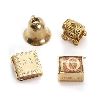 Lot 281 - A group of four 9ct gold charms