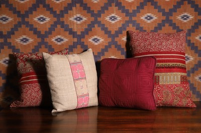 Lot 652 - A group of four sari, quilted and Chinese fabric cushions