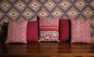 Lot 507 - A group of five sari and quilted fabric cushions