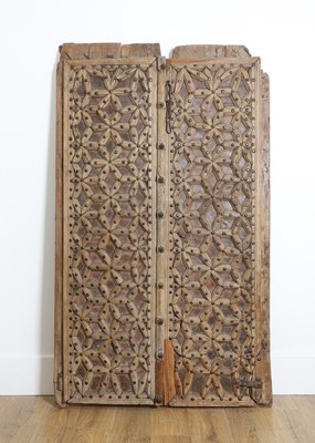 Lot 674 - A pair of Indian hardwood doors
