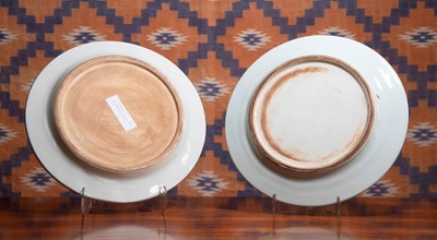 Lot 542 - A pair of Copeland style pottery chargers