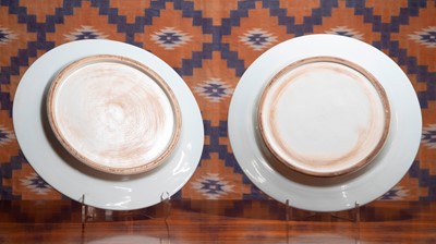 Lot 547 - A pair of Copeland style pottery chargers