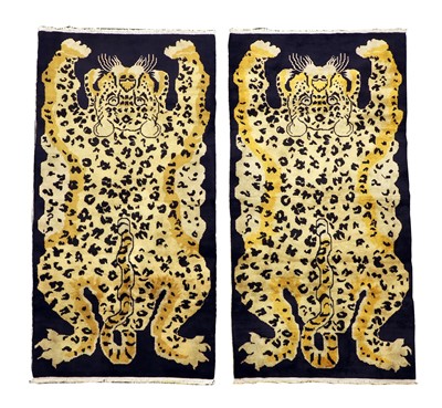 Lot 665 - A pair of Tibetan wool rugs