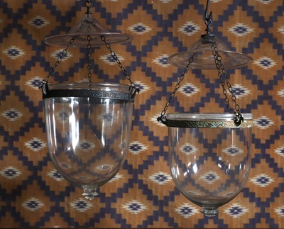 Lot 586 - A pair of clear glass mosque lanterns