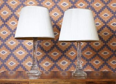 Lot 255 - A pair of cut clear glass column table lamps