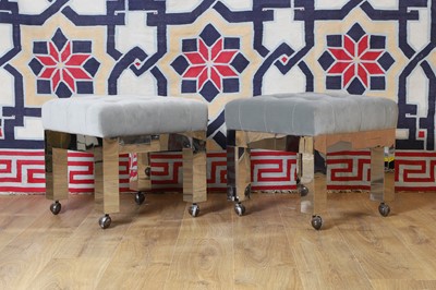 Lot 509 - A pair of polished metal stools