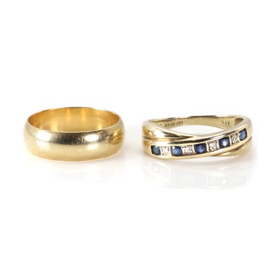 Lot 272 - A 9ct gold sapphire and diamond ring and a wedding ring