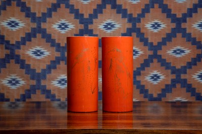 Lot 563 - A pair of porcelain cylindrical vases