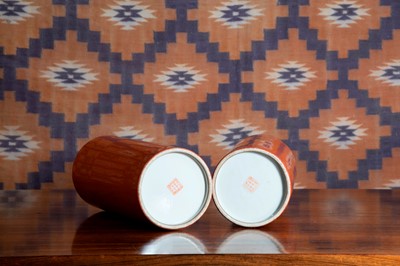 Lot 563 - A pair of porcelain cylindrical vases