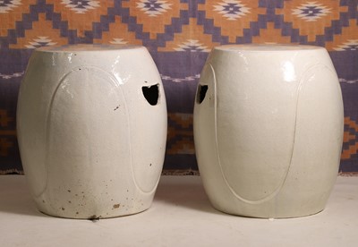 Lot 733 - A pair of cream glazed stoneware barrel seats