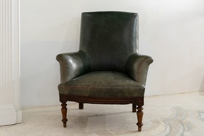 Lot 297 - A beech-framed green leather library chair