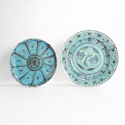 Lot 434 - A Persian turquoise-glazed pottery dish