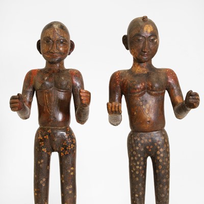 Lot 15 - A pair of carved wooden and painted marriage figures