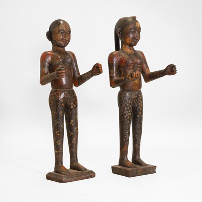Lot 15 - A pair of carved wooden and painted marriage figures
