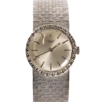 Lot 345 - A ladies' white gold diamond set Longines mechanical watch, c.1960's