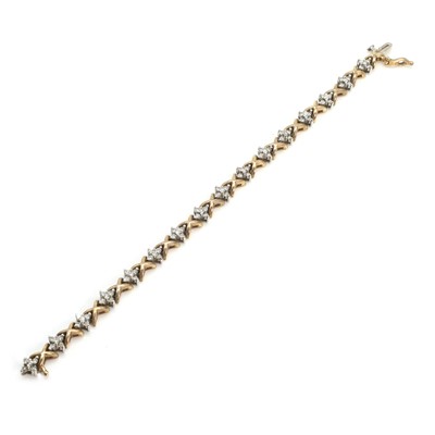 Lot 230 - A 9ct two colour gold diamond bracelet
