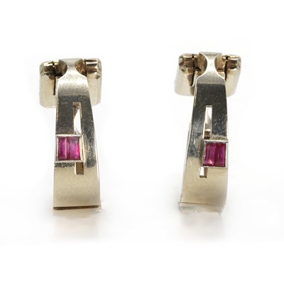 Lot 318 - A pair of 18ct white gold and ruby stirrup cufflinks, by Van Cleef & Arpels