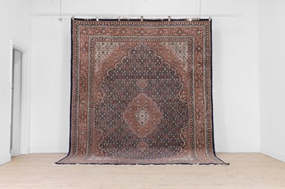 Lot 261 - A wool carpet of Persian Bidjar design