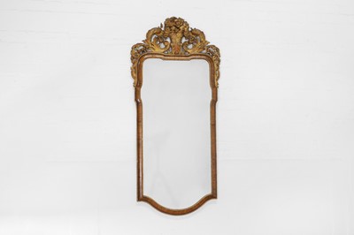 Lot 202 - A George I-style walnut and parcel-gilt pier mirror