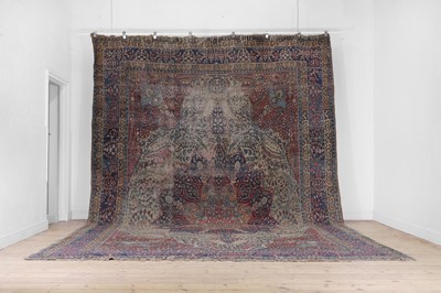 Lot 586 - A wool carpet