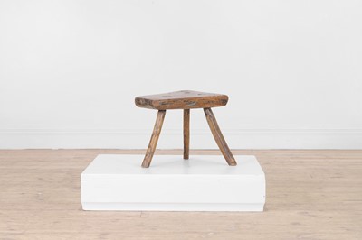 Lot 204 - A small vernacular elm milking stool