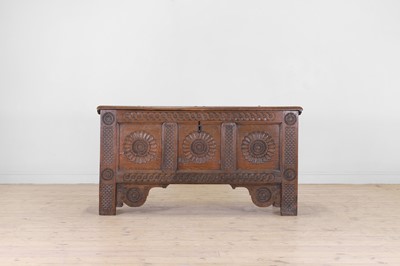Lot 351 - A carved oak coffer