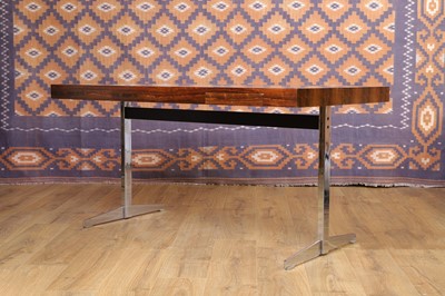 Lot 429 - A modernist rosewood and chrome desk