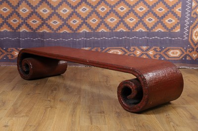 Lot 254 - A red-lacquered low table