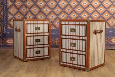Lot 62 - A pair of leather-bound bedside chests
